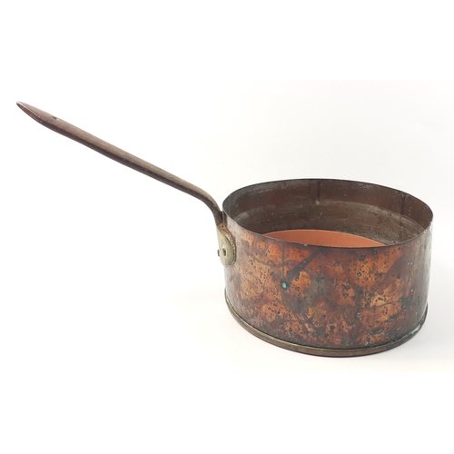 588 - A substantial large copper saucepan 27cm diameter, latterly used as a planter#594