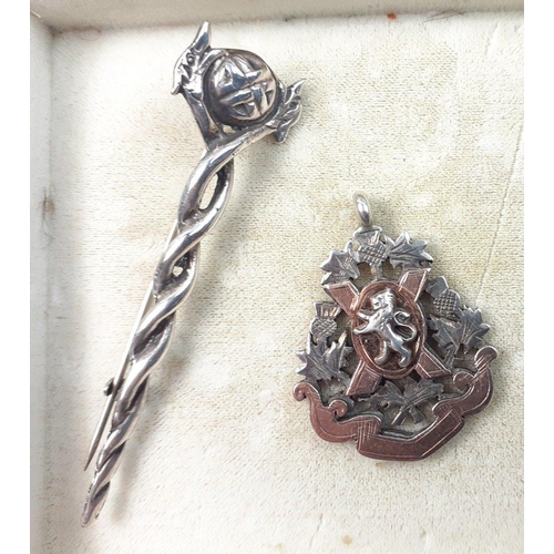 89 - A Scottish Celtic twist kilt pin sterling silver brooch and a rather lovely thistle fob with lion ra... 