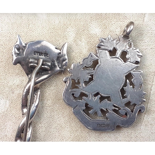 89 - A Scottish Celtic twist kilt pin sterling silver brooch and a rather lovely thistle fob with lion ra... 