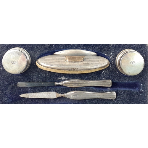 96 - A silver hallmarked manicure set in presentation box from George K Paul of Lothian Road, Edinburgh. ... 