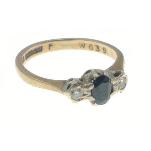 10 - A rather lovely 9ct gold hallmarked ring with dark blue sapphire flanked by 2 tested diamonds, size ... 