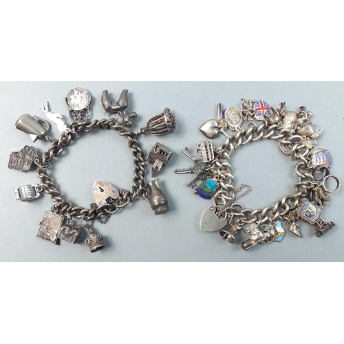 112 - Two substantial bracelets with silver charms. Lots of super charms some articulated.#112