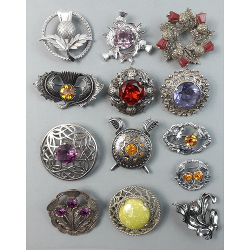 113 - A lovely collection of thirteen Scottish inspired costume brooches. Very attractive pieces.#113