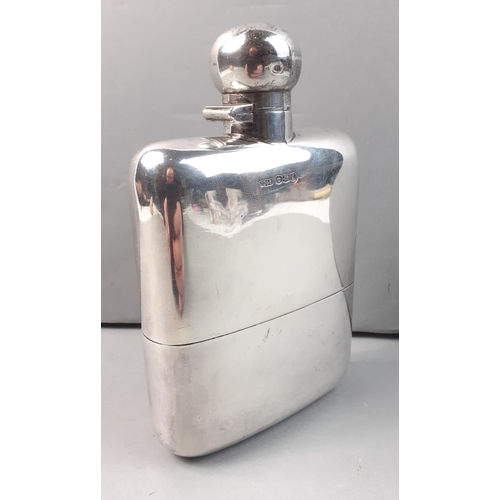 119 - A solid silver gentleman's large hip flask carrying full hallmarks for Sheffield 1949.  Makers James... 