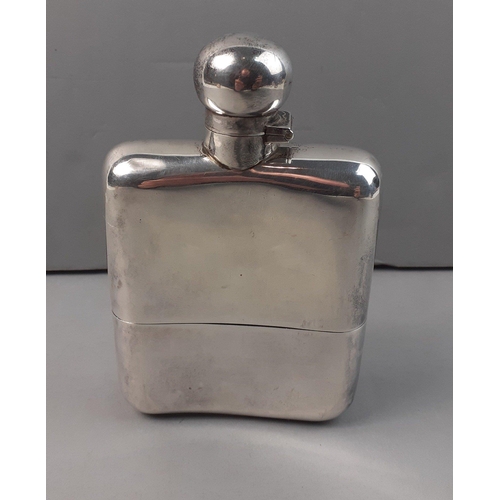 119 - A solid silver gentleman's large hip flask carrying full hallmarks for Sheffield 1949.  Makers James... 