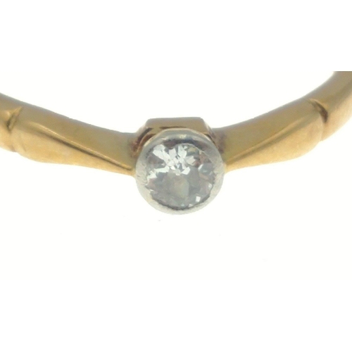 12 - An 18kt stamped ring set with a solitaire diamond (tested), size L/M, gross weight 1.75g approx#12... 