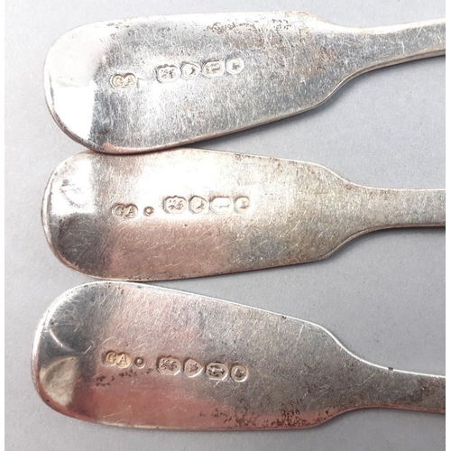 121 - A set of three monogrammed spoons with matching hallmarks for London 1867 Maker GA.  Each 18cm long ... 