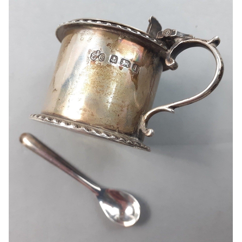 125 - A BIRMINGHAM hallmarked silver mustard pot with blue glass liner and comes with a small white metal ... 