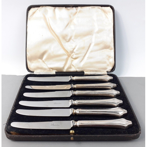 133 - A set of 6 butter knives with silver handles hallmarked Sheffield 1938, made by CMA#133