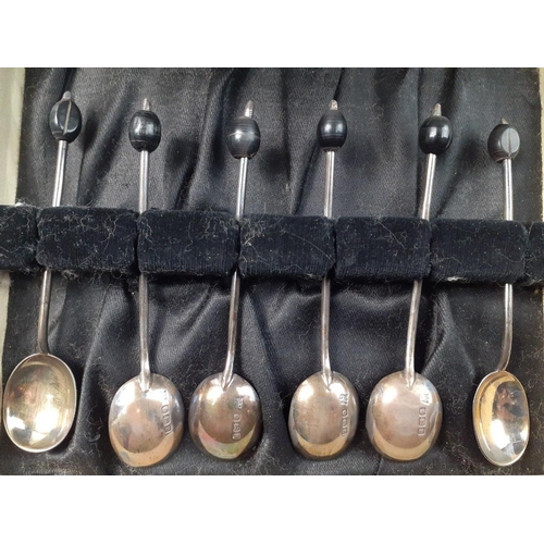 136 - A cased set of six STERLING SILVER coffee bean spoons in a Cyril Russell of Glasgow case.  Lovely co... 