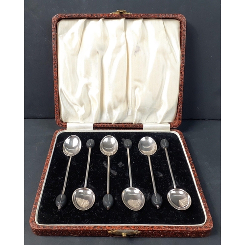 149 - A boxed set of 6 silver coffee bean spoons, hallmarked for Birmingham 1937. Gross weight 38g approx#... 