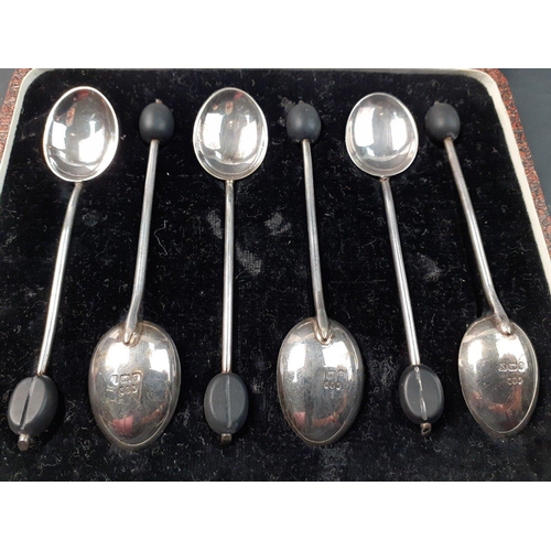 149 - A boxed set of 6 silver coffee bean spoons, hallmarked for Birmingham 1937. Gross weight 38g approx#... 