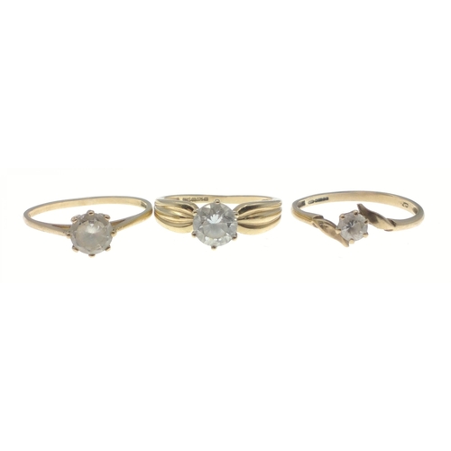 16 - Three 9ct hallmarked rings set with white stones, two size O/P the other size L, bands are slightly ... 