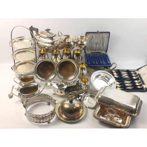 160 - A mixed lot of silver plated flatware to include 6 goblets, a 3 piece tea service, coasters, serving... 