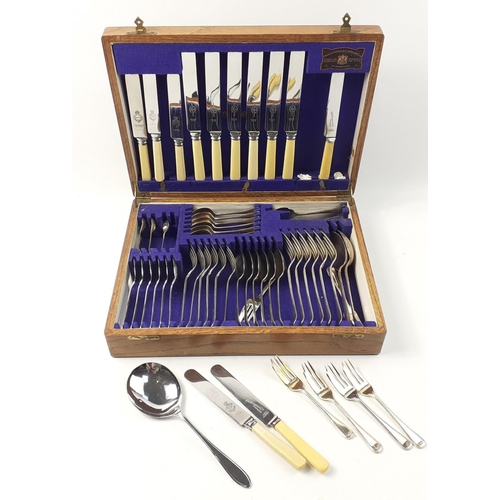 162 - A beautiful flatware box by Viners of Sheffield containing assorted plated tableware.  Most pieces n... 