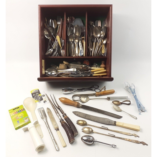 163 - Kitchen drawer containing a interesting miscellany of cutlery, tea caddy spoons and bits and bobs#16... 