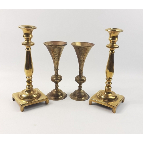 169 - Two pairs of Indian brass candlesticks 20 and 26cm tall#169