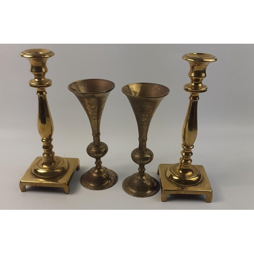 169 - Two pairs of Indian brass candlesticks 20 and 26cm tall#169