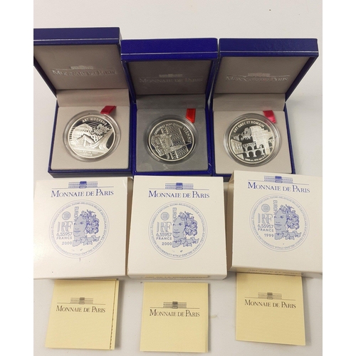 189 - Three beautiful MONNAIE DE PARIS silver proof coins each beautifully presented in a plush case with ... 