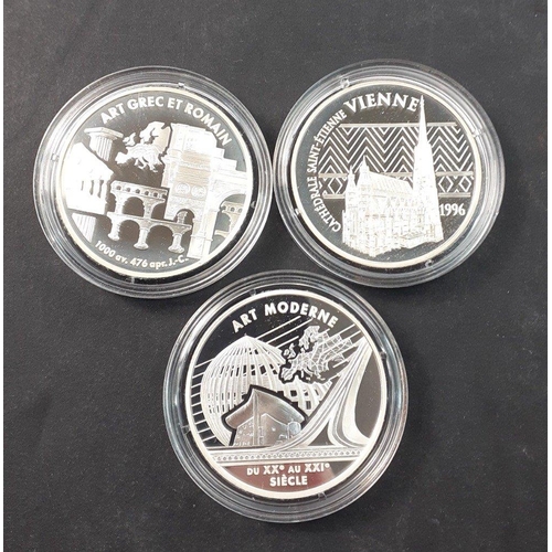 189 - Three beautiful MONNAIE DE PARIS silver proof coins each beautifully presented in a plush case with ... 