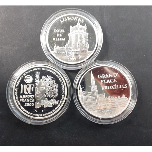 192 - Three beautiful MONNAIE DE PARIS silver proof coins each beautifully presented in a plush case with ... 