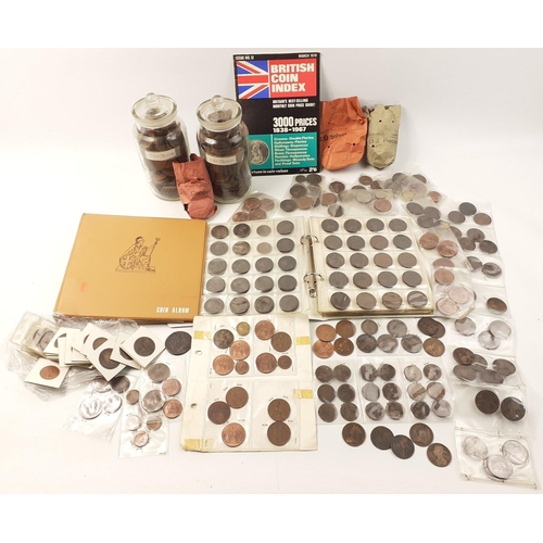 217 - A great lot of collectible UK obsolete coins to include two sweet jars filled with over 600 copper p... 