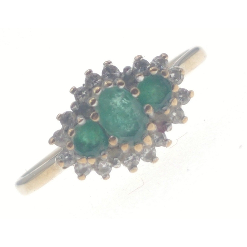 25 - Purchased in HATTON GARDEN London.  A marvellous 9 carat gold and emerald and diamond 9 (tested) rin... 