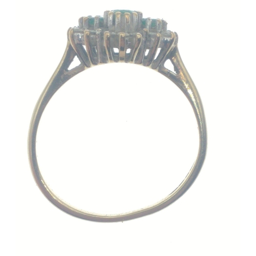 25 - Purchased in HATTON GARDEN London.  A marvellous 9 carat gold and emerald and diamond 9 (tested) rin... 