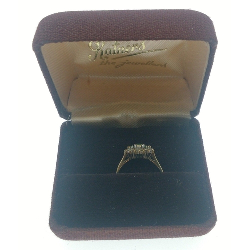 25 - Purchased in HATTON GARDEN London.  A marvellous 9 carat gold and emerald and diamond 9 (tested) rin... 