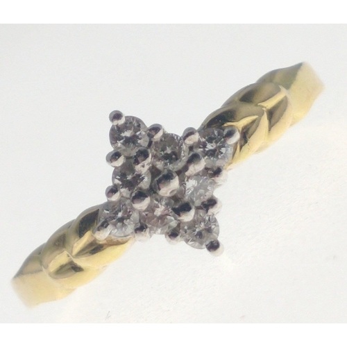 28 - A 750 stamped ring set with  tested diamonds in a diamond shape, size O, gross weight 4.23g approx#2... 