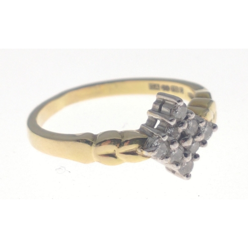 28 - A 750 stamped ring set with  tested diamonds in a diamond shape, size O, gross weight 4.23g approx#2... 