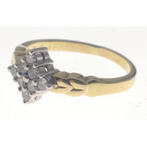 28 - A 750 stamped ring set with  tested diamonds in a diamond shape, size O, gross weight 4.23g approx#2... 