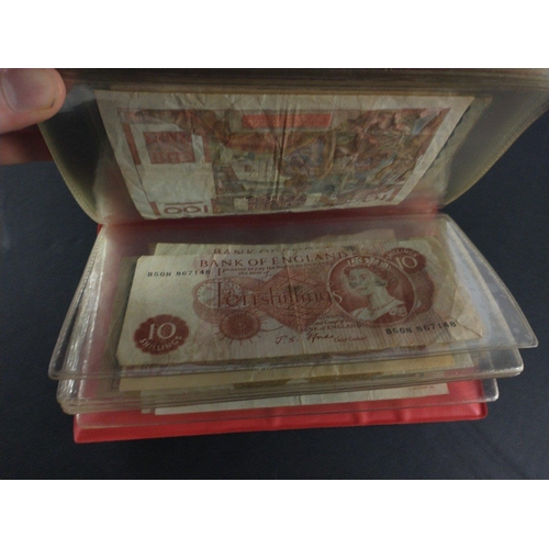 296 - An album containing world banknotes of interest to include Japanese Occupation note, China Hell note... 