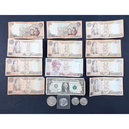 303 - Of numismatic interest - a quantity of old paper money from Cyprus etc, and 3 x 1964 silver half dol... 