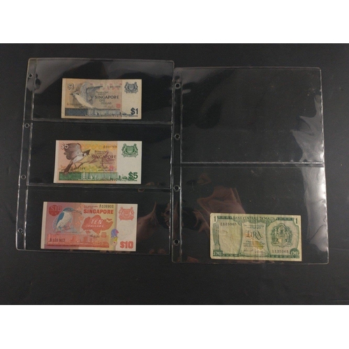 305 - A collection of Asian Bank Notes of interest to include Japanese Occupation Notes, Singapore, Chines... 