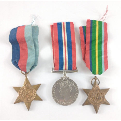 347 - Three WWII British War Medals to include 39-45 Star, Pacific Star, War Service Medal. Lot includes a... 