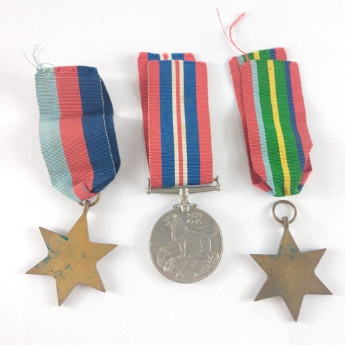 347 - Three WWII British War Medals to include 39-45 Star, Pacific Star, War Service Medal. Lot includes a... 