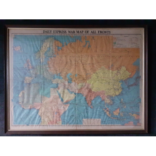 350 - A large framed Daily Express war map of all fronts dated 1941.  The map has folds and wear but the m... 