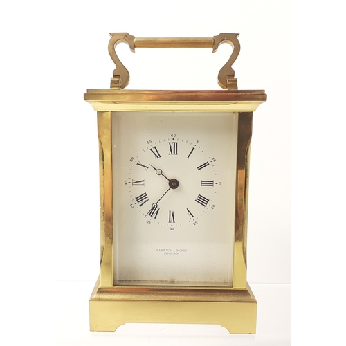 352 - A SUBSTANTIAL HAMILTON & INCHES of EDINBURGH brass carriage clock with quartz movement - dimensi... 