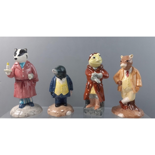 371 - A collection of BESWICK WARE WIND IN THE WILLOWS of figurines to include RATTY, BADGER, TOAD and MOL... 