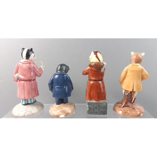 371 - A collection of BESWICK WARE WIND IN THE WILLOWS of figurines to include RATTY, BADGER, TOAD and MOL... 