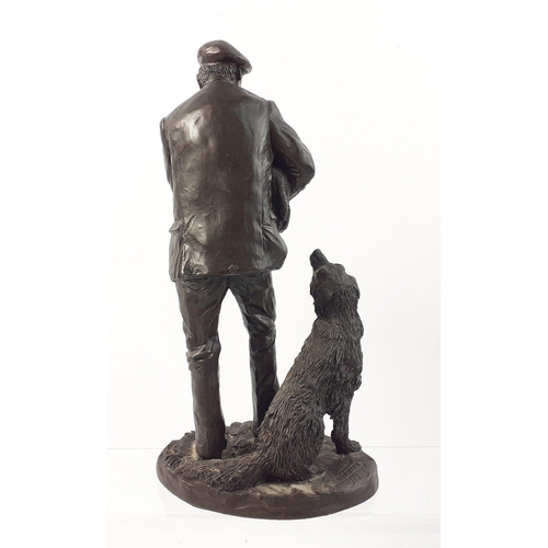 383 - A charming resin figurine of a shepherd with his collie and carrying a lamb, stamped ELPHICK 1979, s... 