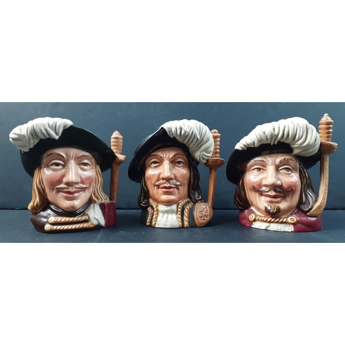 390 - Three ROYAL DOULTON Musketeers character jugs consisting of PORTHOS in good condition, ARAMIS in goo... 