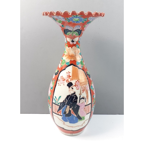 441 - A trumpet shape, JAPANESE IMARI style vase with a decorative scalloped edge top.  Four panels, hand ... 