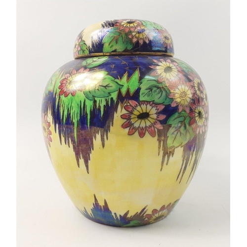 445 - A stunning and vibrant ginger jar with lustrous flowers - standing approximately 20cm tall- in beaut... 