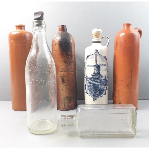 477 - A wonderful collection of 4 stoneware wine bottles to include a Georgkreuzberg Rheinpreussen - very ... 