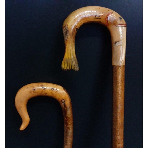 496 - 2 hand carved Shepherds Crooks from a farm in the Scottish Borders.  One with the handle in the shap... 