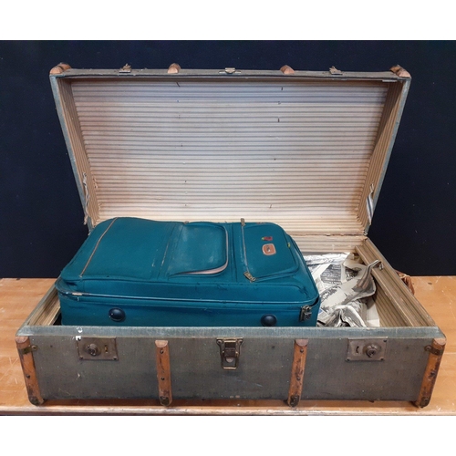 501 - A large wooden banded travel trunk with brass corners 90x55x35cm approx, with wear in useable condit... 