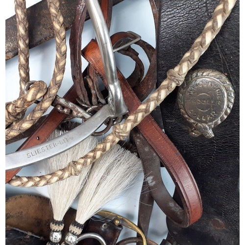 506 - Saddle up with a horse riding leather lot to include bits, one marked McConchie Dollar, bridles etc ... 