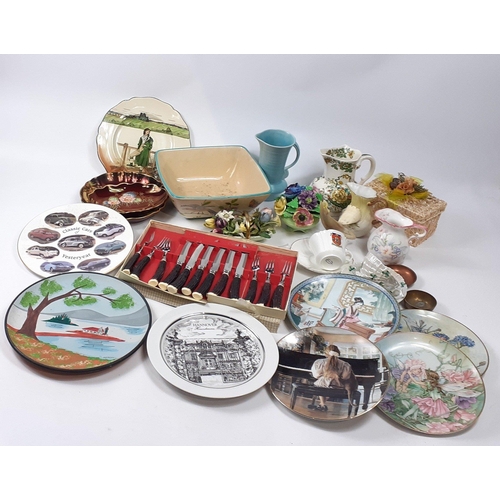 599 - A mixed lot to include various collectors' plates, a set of steak knives and forks, an exotic bird a... 